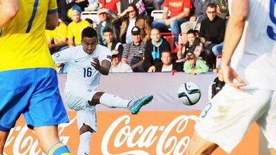 Jesse Lingard of England scores the winning goal against Sweden on Sunday in their Euro Under 21 Championship group match in Olomouc, Czech Republic. Peter Powell / EPA / June 21, 2015