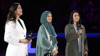 WTA Finals tournament director Garbine Muguruza, left, Saudi Tennis Federation president Arij Mutabagani, centre, and Ons Jabeur during the opening ceremony of the WTA Finals. Getty Images
