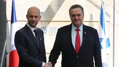 Israeli Foreign Minister Israel Katz, right, who is to become defence minister, welcomes French Foreign Minister Jean-Noel Barrot in Jerusalem. EPA