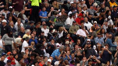 Fans held a sign referring to Rodriguez. He did face a hostile reception at the White Sox stadium. Frank Polich / EPA