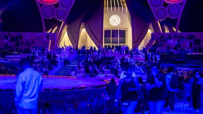 People wait for the light show.