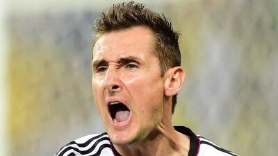 Miroslav Klose celebrates after scoring for Germany against Ghana on Saturday at the 2014 World Cup in Fortaleza, Brazil. Javier Soriano / AFP / June 21, 2014