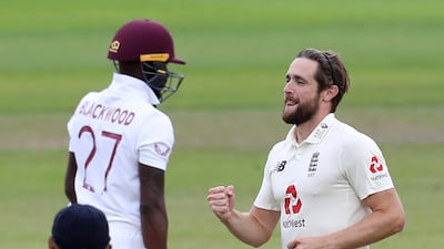 England's Chris Woakes, right, celebrates the dismissal of West Indies' Jermaine Blackwood at Old Trafford in Manchester on Saturday. AP