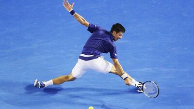 Novak Djokovic of Serbia plays a backhand in his quarter final match against Kei Nishikori of Japan during day nine of the 2016 Australian Open at Melbourne Park on January 26, 2016 in Melbourne, Australia. Michael Dodge/Getty Images)