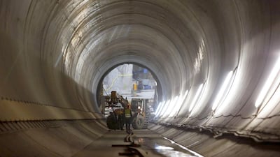Workers are pictured as construction continues at the site of the Nant de Drance hydropower plant near the village of Finhaut. Pierre Albouy / Reuters