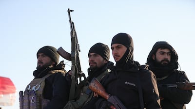 Syrian government forces near Al-Aqtan prison in Raqqa on Monday. Getty Images