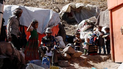 Displaced Yemenis sit near their huts at a camp for Internally Displaced Persons (IDPs) on the outskirts of Sana'a, Yemen. EPA