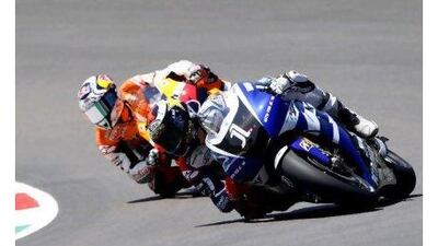 Jorge Lorenzo, right, was able to keep his Yamaha ahead of the Honda ridden by Andrea Dovizioso to win the MotoGP Italian Grand Prix yesterday at the Mugello circuit in Scarperia, Italy.