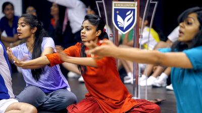 The music, primed with a lot of percussion against tracks ranging from pop, rap and guitar solos, are complemented with a monochromatic set design and flowing black-and-white stylised costumes. Antonie Robertson / The National