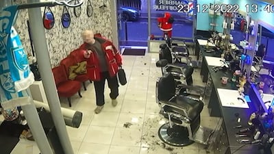 A still from a surveillance video shows the suspected gunman in a salon after firing shots outside a Kurdish centre in Paris. AFP