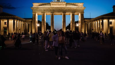 Brandenburg Gate, Germany's most recognisable landmark, is lit up at night ... but not for much longer, as its lights are set to go out each night. EPA