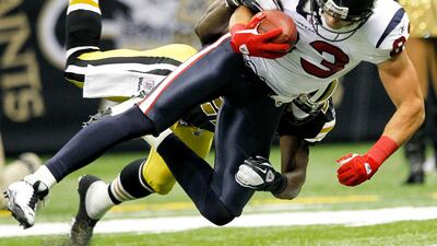 Houston Texans wide receiver Kevin Walter (83) scores against the New Orleans Saints during their NFL football game in New Orleans, Louisiana September 25, 2011. Sean Gardner / Reuters