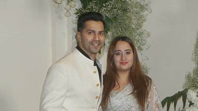 Varun Dhawan and Natasha Dalal looked opulent in white and silver