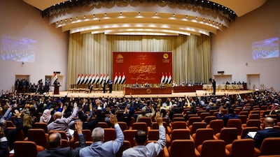 Some members of the Iraqi Parliament have alleged that procedure was not followed in the vote on Tuesday to pass three pieces of legislation. Iraqi Parliament Media Office / AFP
