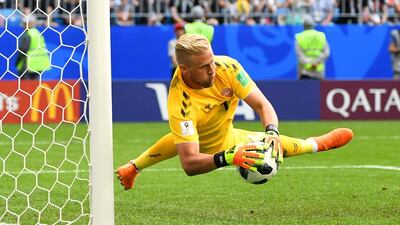 Denmark's Kasper Schmeichel makes a save. Dylan Martinez / Reuters