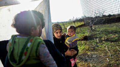 About 30,000 Syrians were at the Turkish border after fleeing a Russia-backed regime offensive on the northern region of Aleppo, Turkish Prime Minister Ahmet Davutoglu said on February 8, 2016, as his country faced pressure to open its border. AFP