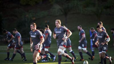 Wales’ players are used to tough training schedules, but Doha will bring a whole new range of challenges. Gianluigi Guercia / AFP