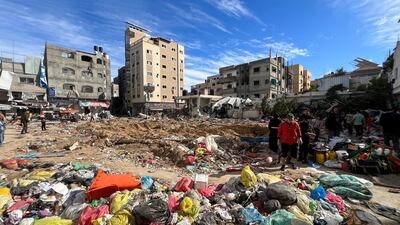 Palestinians inspect the damage following an Israeli raid at Kamal Adwan Hospital. Reuters