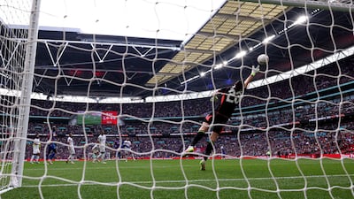 Emiliano Martinez fails to save a shot from Eberechi Eze. Getty Images