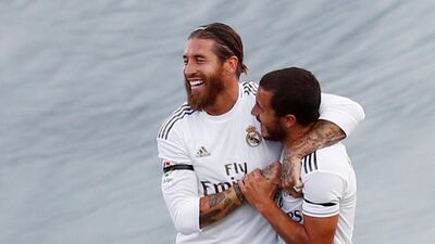 Real Madrid's Sergio Ramos celebrates scoring their second goal with Eden Hazard. Reuters