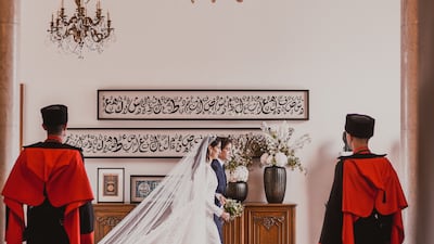 Prince Hashem and Princess Rajwa enter Zahran Palace for the wedding ceremony. EPA