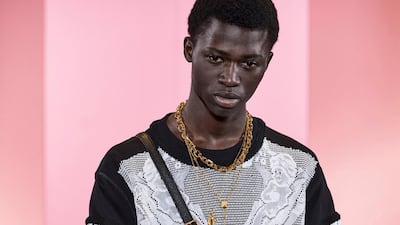 Lace was over layered onto menswear for the 'DNA' collection. Courtesy Dolce & Gabbana