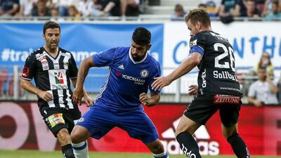 Chelsea striker Diego Costa in action against Michael Sollbauer of RZ Pellets. Srdjan Stevanovic / Getty Images
