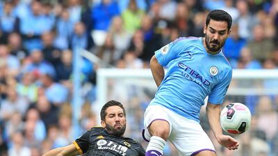 Manchester City's German midfielder Ilkay Gundogan has tested positive for Covid-19. AFP