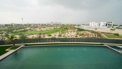 The infinity pool and garden look out on to the Dubai Hills Golf Club. Courtesy Allsopp and Allsopp