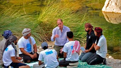 Prince William meets with locals in the village of Wadi Arbaeen. AFP