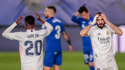Real Madrid's Vinicius Junior, left, and Karim Benzema after a missed chance. AP
