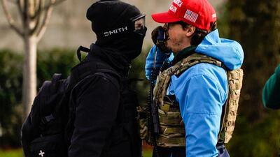 A counter-protester taunts a supporter of President Donald Trump during political clashes in Olympia, Washington. AFP