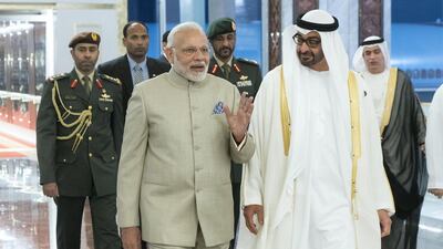 11ABU DHABI, UNITED ARAB EMIRATES - February 10, 2018: HH Sheikh Mohamed bin Zayed Al Nahyan Crown Prince of Abu Dhabi Deputy Supreme Commander of the UAE Armed Forces (R), receives HE Narendra Modi Prime Minister of India (L), at the Presidential Airport. ( Rashed Al Mansoori / Crown Prince Court - Abu Dhabi ) ---