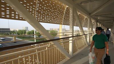 Abu Dhabi has built many footbridges over major roads and motorways to curb pedestrian deaths. Ravindranath K / The National
