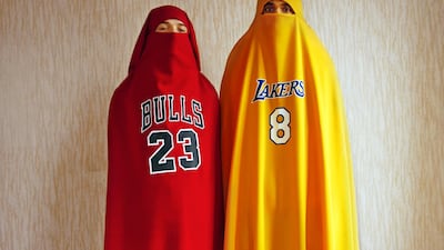 One of Lamrabat's works feature two people in chadors, one is yellow and bears the Los Angeles Lakers logo with Kobe Bryant’s eight, the other bears Michael Jordan’s 23 under the Chicago Bulls’ lettering. Mous Lamrabat