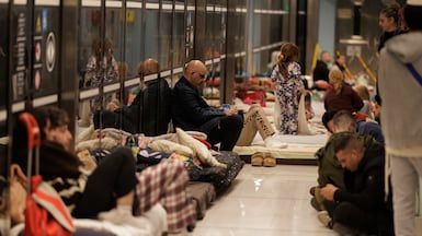 Israelis shelter in an underground tram station during air strikes in Ramat Gan. Bloomberg