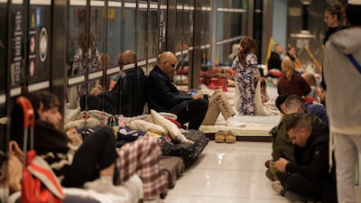 Israelis shelter in an underground tram station during air strikes in Ramat Gan. Bloomberg