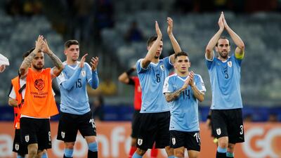 Soccer Football - Copa America Brazil 2019 - Group C - Uruguay v Ecuador - Mineirao Stadium, Belo Horizonte, Brazil Uruguay's Lucas Torreira, Diego Godin and team mates applaud fans after the match. Reuters