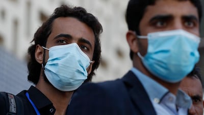 Yemenis wear protective face masks at a hospital amid concerns over the coronavirus pandemic. EPA