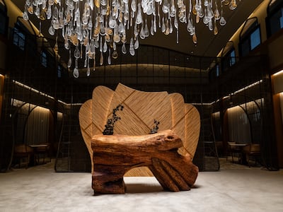 Gerbou's reception desk is crafted from a fallen Ghaf tree. Photo: Gerbou