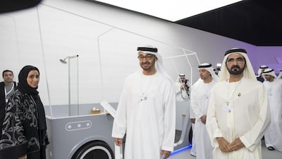 Sheikh Mohamed bin Zayed and Sheikh Mohammed bin Rashid are given a tour the Museum of Future Government Services. Mohamed Al Hammadi / Crown Prince Court - Abu Dhabi
