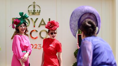 Ladies pose for the camera. Getty Images