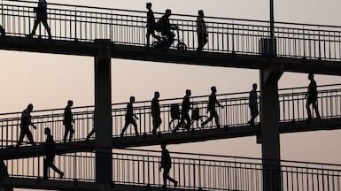 People commute home in Dubai. The UAE's digital transformation will help create jobs in manufacturing, education and retail, forecasts say. Chris Whiteoak / The National