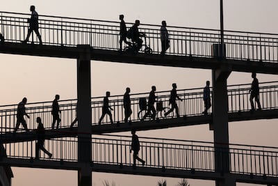 The UAE's digital transformation will help create jobs in manufacturing, education and retail, forecasts say. Chris Whiteoak / The National