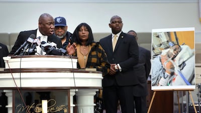 Civil rights lawyer Ben Crump speaks, flanked by the parents of Tyre Nichols and faith and community leaders. AFP