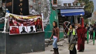 Martyrs' memorial tribute to monks who have set themselves alight in eastern Tibet in the past year stands at the entrance to the Dalai Lama´s temple in McLeod Ganj, India.