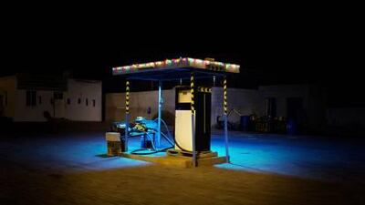 A photo from an exhibition at the Pavilion, central Dubai, showing a small diesel station near Dubai. A letter writer says the photo evokes a time when long desert journeys ended at the first sign of civilisation.