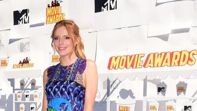 Actress Bella Thorne poses on arrival for the 2015 MTV Movie Awards on April 12, 2015 in Los Angeles. Frederic J Brown / AFP photo