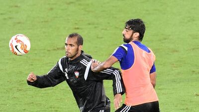Saeed Al Kathiri, left, concedes Al Ain Are favourites given Al Ahli's poor form but they will guard against complacency. Courtesy UAE FA