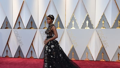 Janelle Monae, wearing a textured Elie Saab dress, arrives at the 89th Oscars on February 26, 2017. AFP